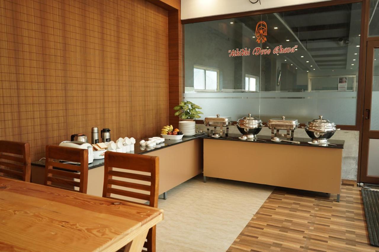 泰卡迪天井酒店 提喀迪 外观 照片