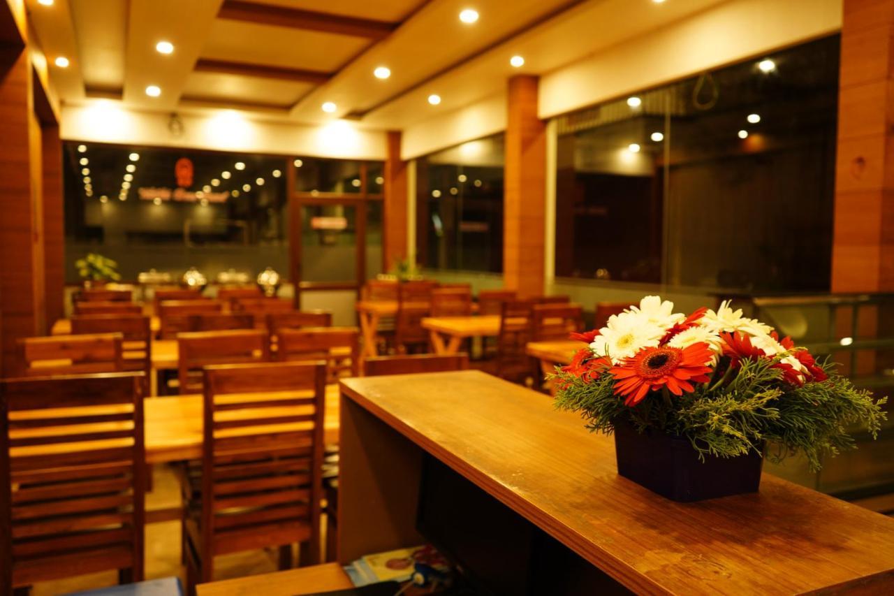 泰卡迪天井酒店 提喀迪 外观 照片